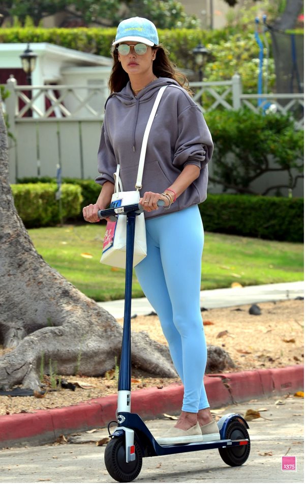 Alessandra Ambrosio with Unagi Scooter